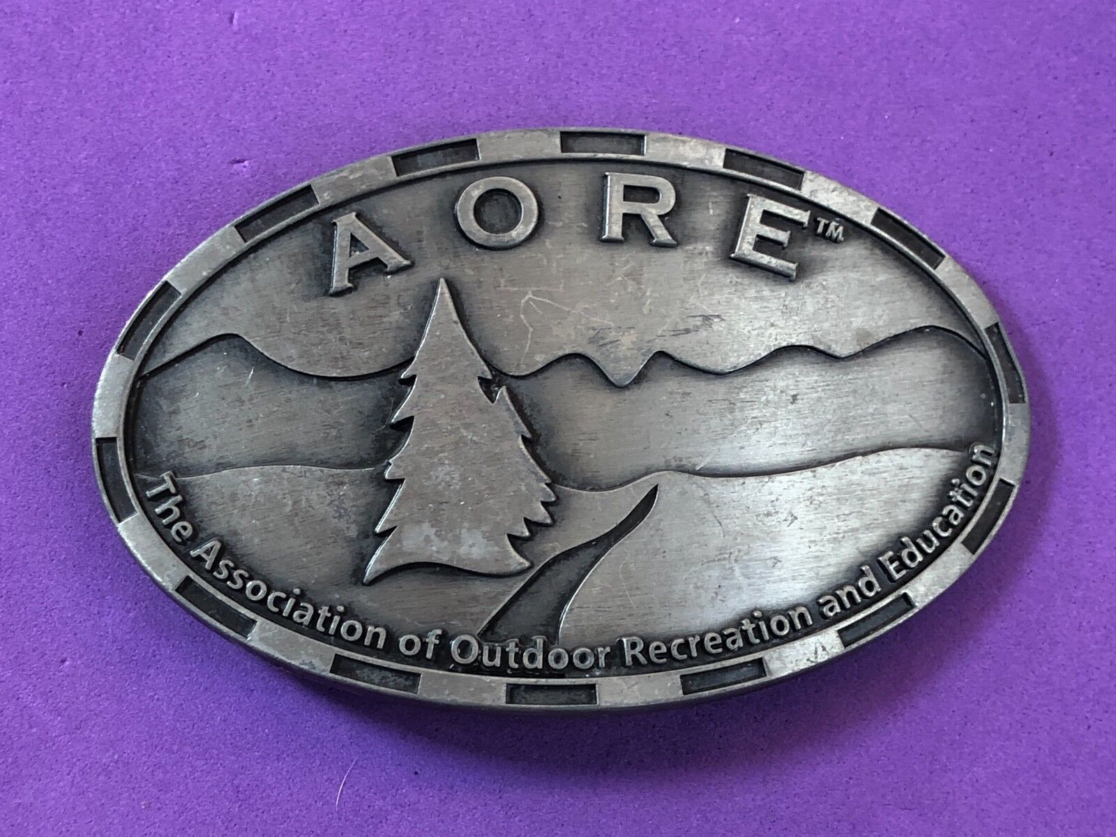AORE Assn of outdoor Recreation and Education belt buckle 