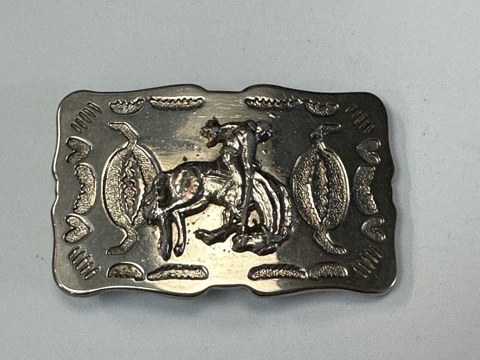 Vintage Cowboy Tipping Hat Head down Saddle Bronc western belt buckle