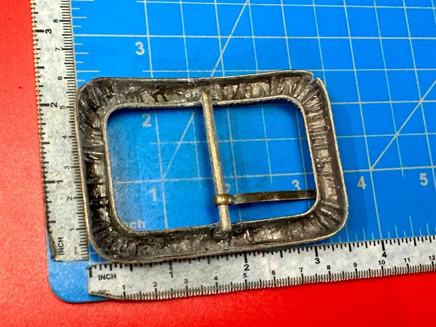 Unique Center Bar Spring abstracted wrapped style rectangular belt buckle