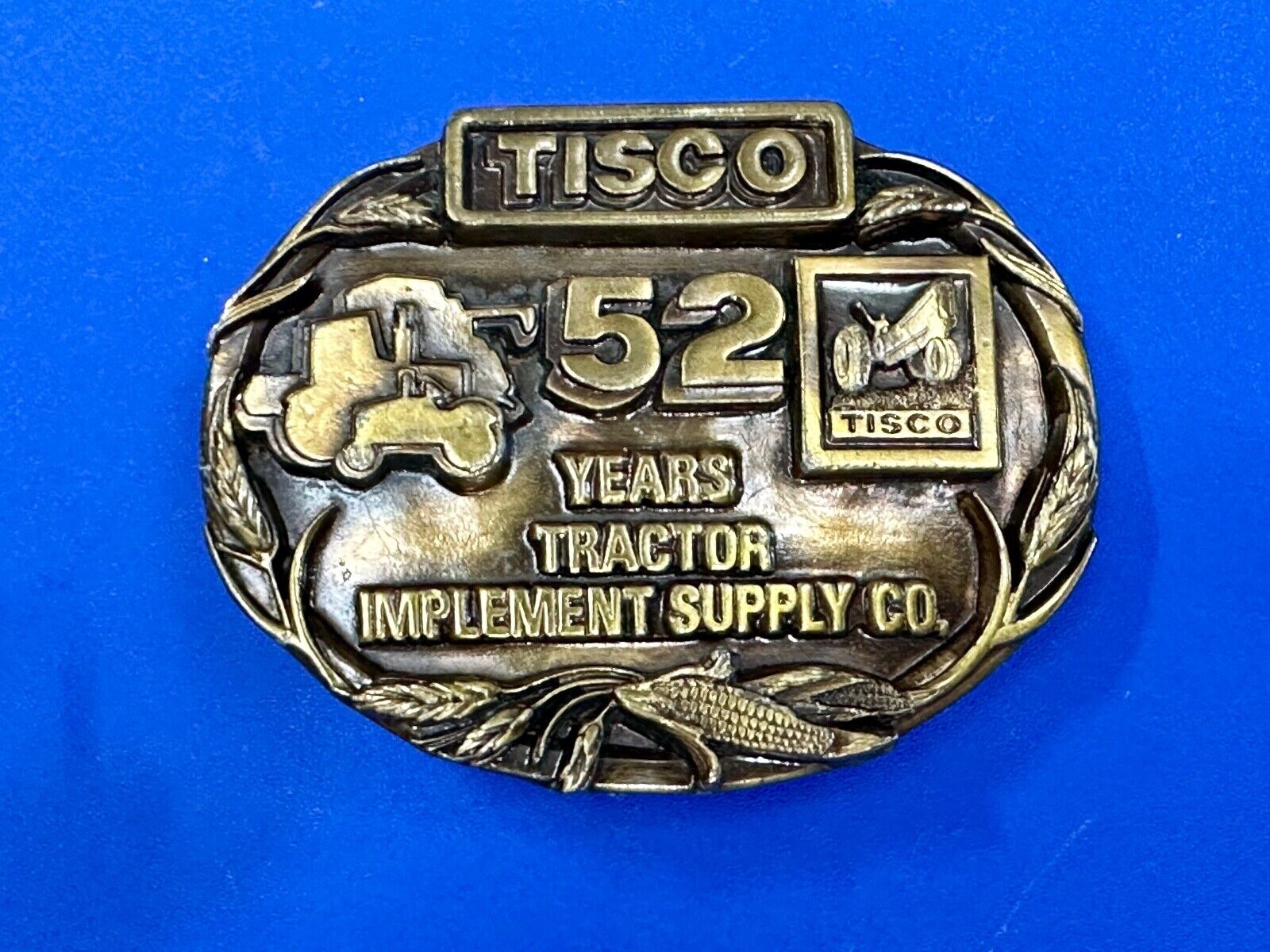 TISCO 52 years commemorative belt buckle  Tractor Implement Supply