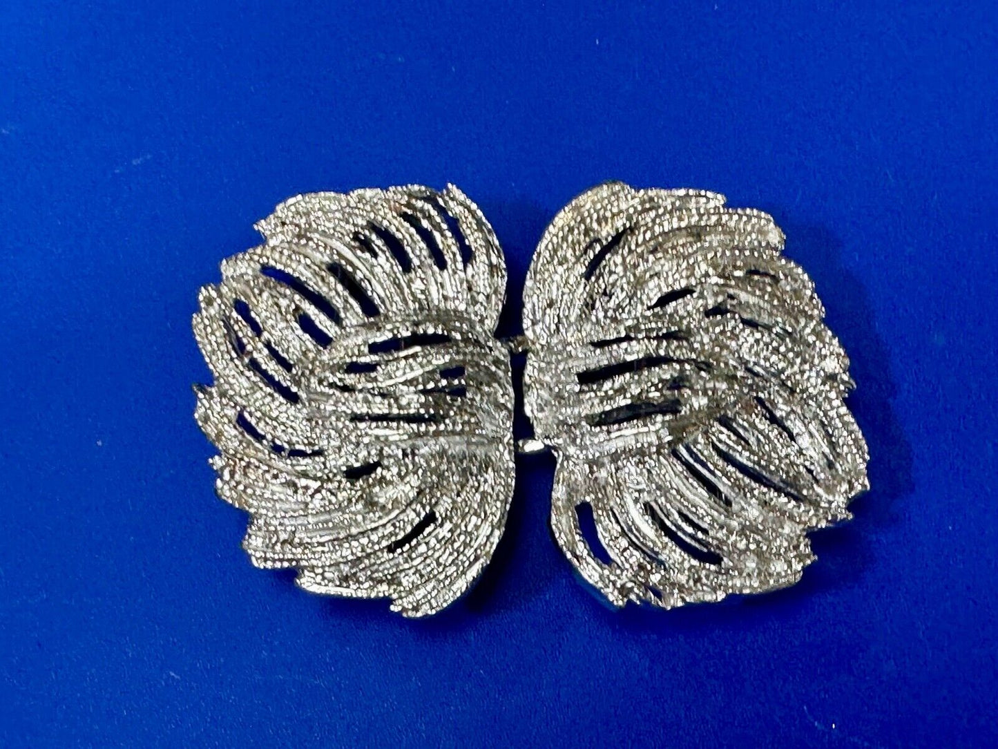Two piece interlocking sea leaf brushed pattern see through pattern belt buckle