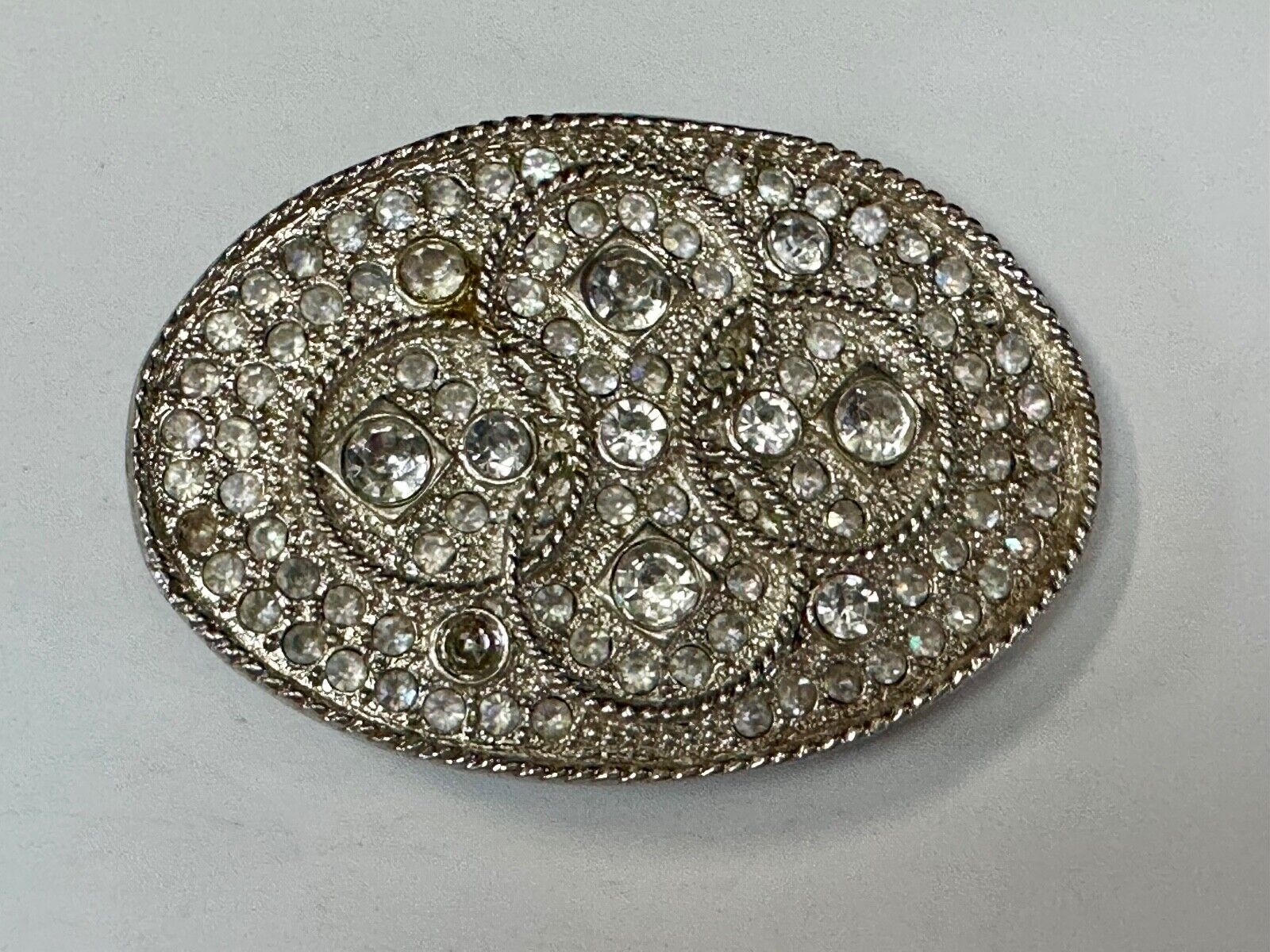 Vintage Appearance silver tone oval Belt Buckle - missing a few Rhinestone's