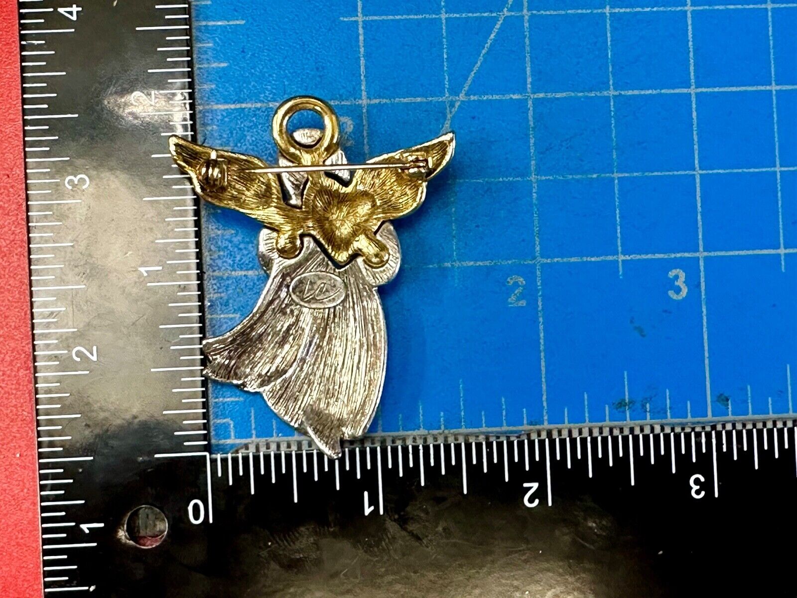 Angle holding heart -vintage two tone LC Liz Claiborne Signed Brooch Pin