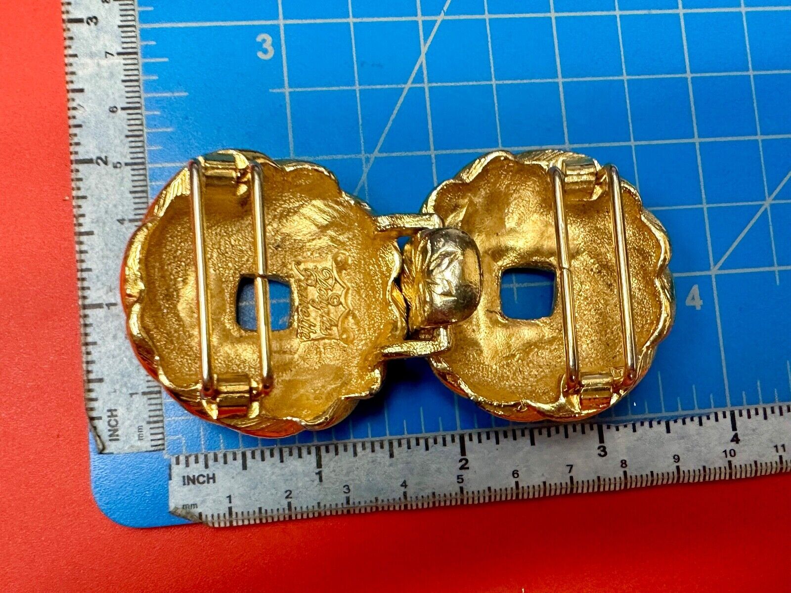 Two piece Round Swirl Interlocking gold color belt buckle by Douglas Paquette
