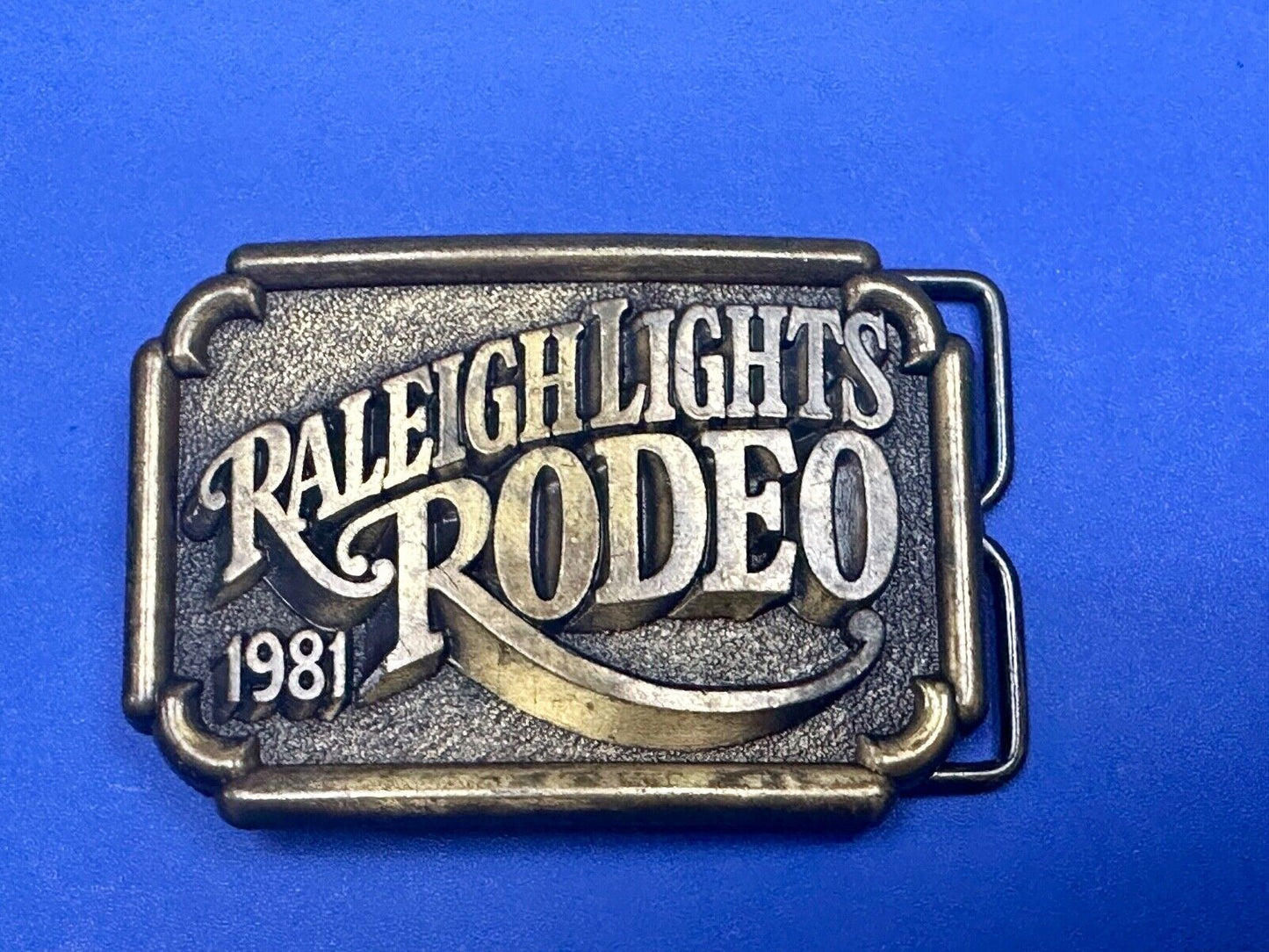 Vintage 1981 Raleigh Lights Rodeo Brass Tone Belt Buckle Advertising Cigarettes