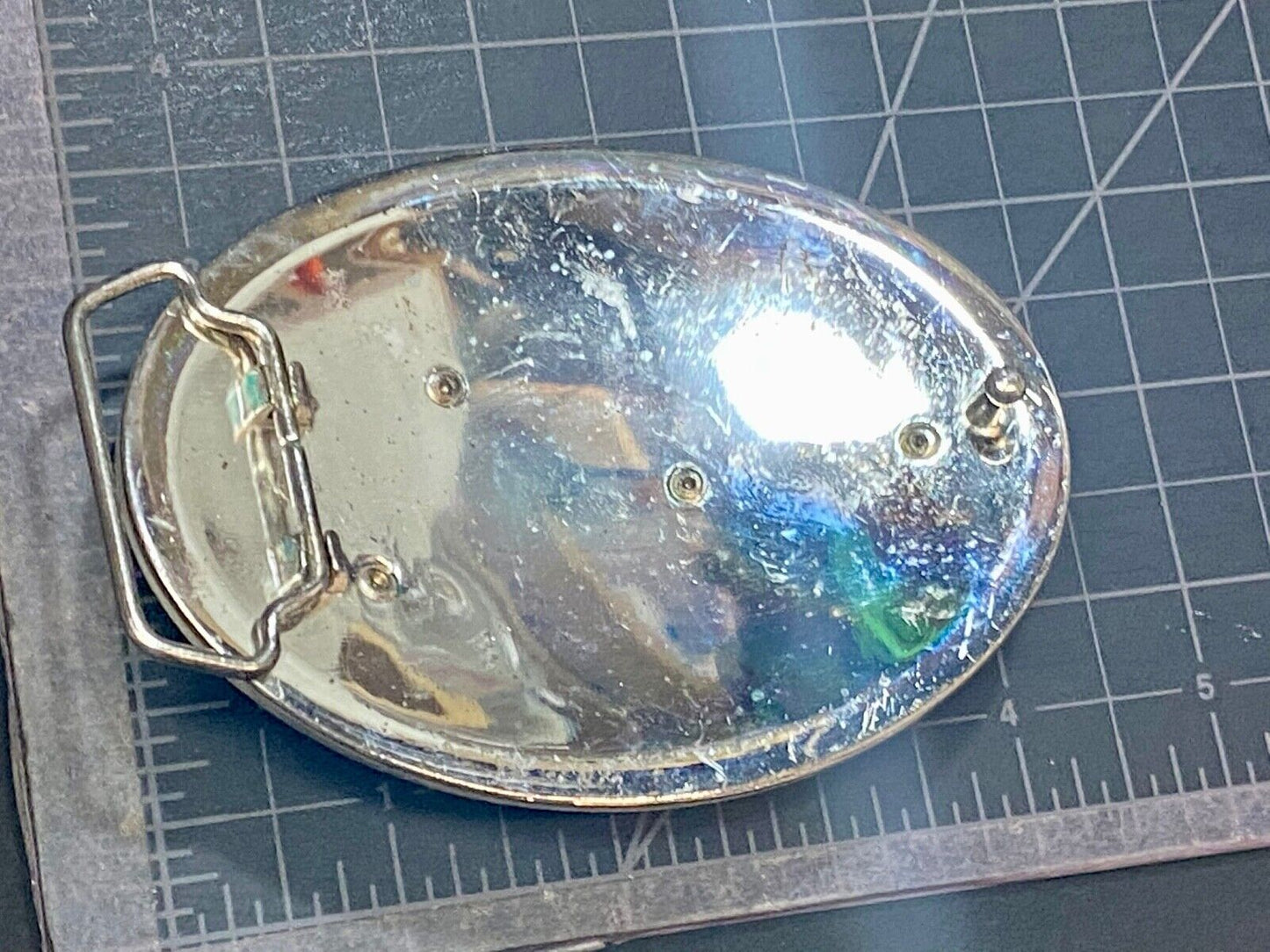 A big Tiger Cat running featured on western oval belt buckle 