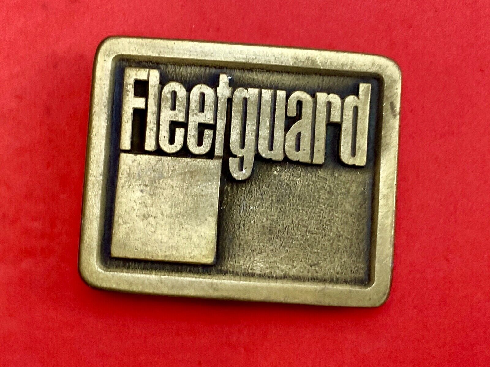 Vintage Fleetguard Construction Equipment Company Advertising Belt Buckle 