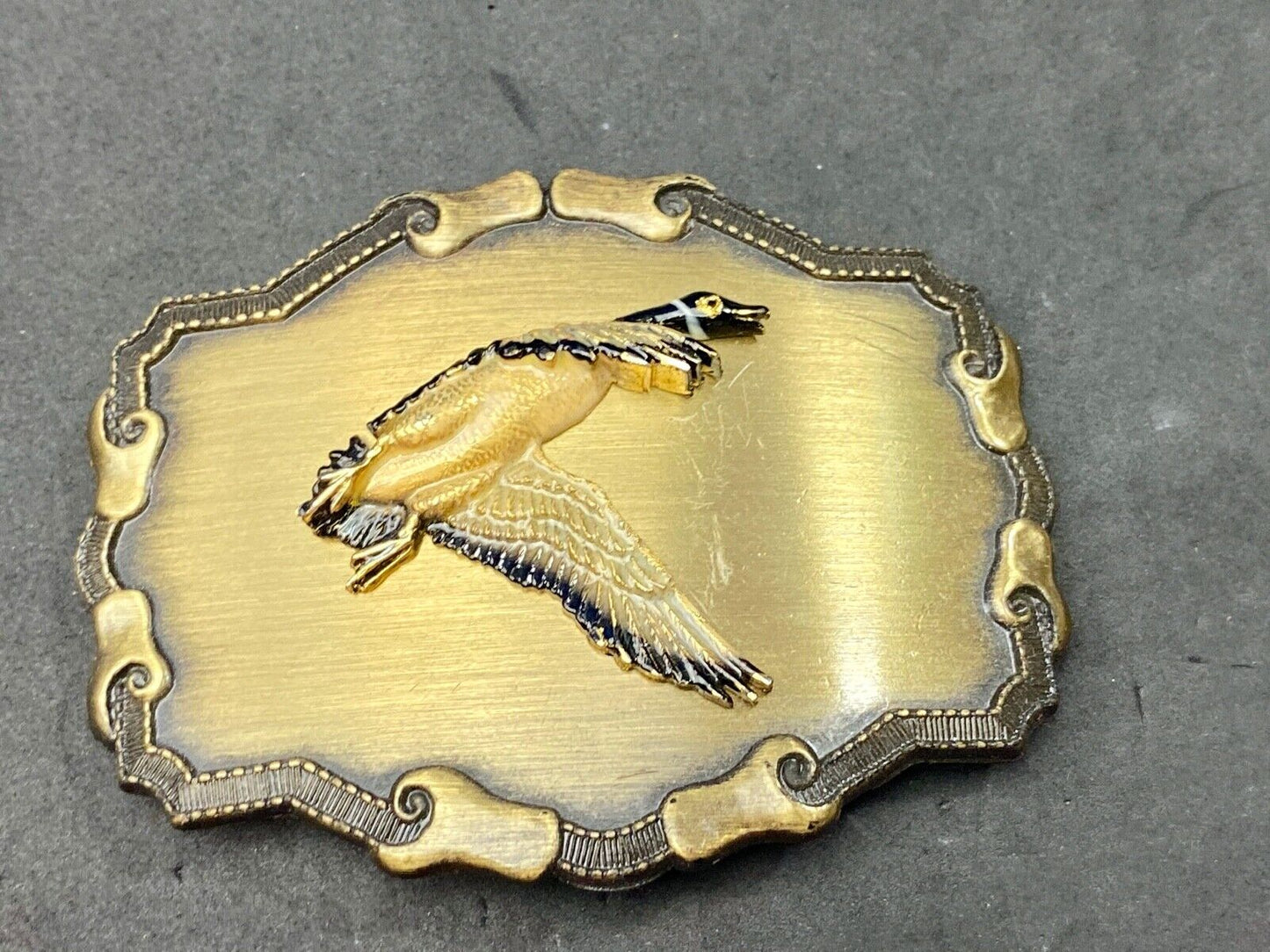 Vintage 1977 GOOSE Western Framed Raintree Belt Buckle - Grouse? Eagle?