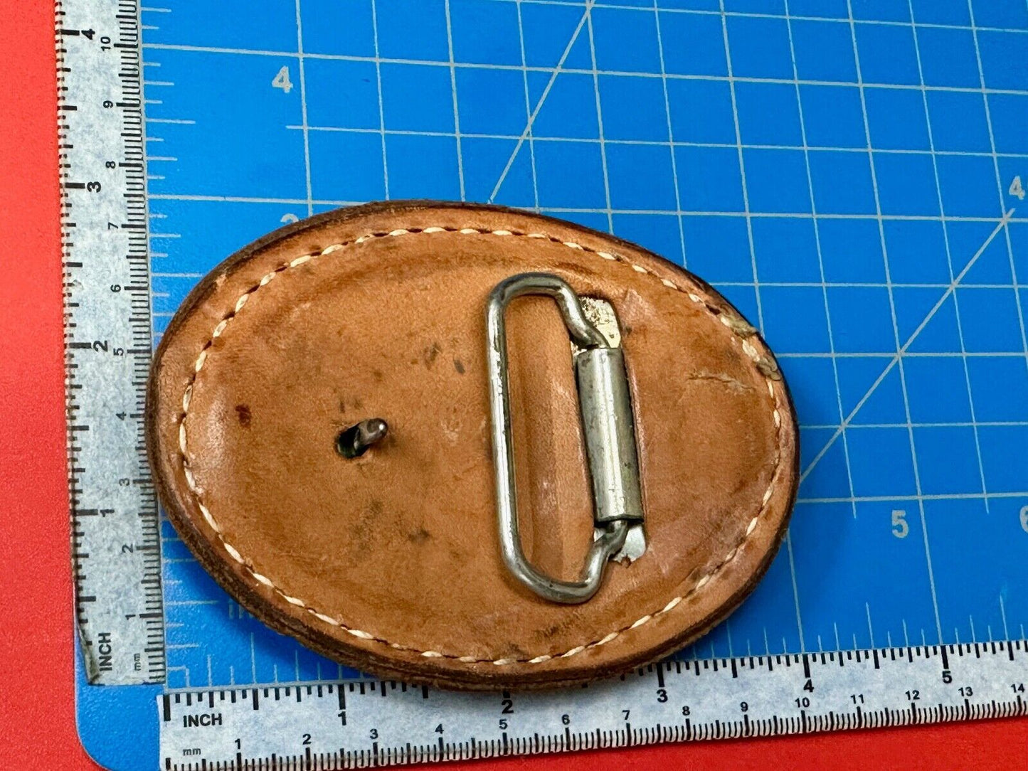 Unique leaf pattern in leather belt buckle made of Abalone shell