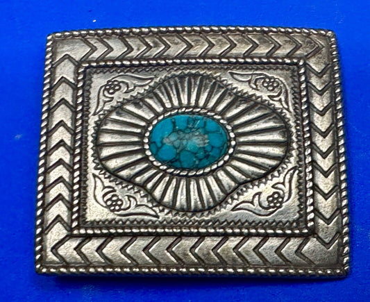 Turquoise Cab centerpiece on southwestern pattern silver tone belt buckle