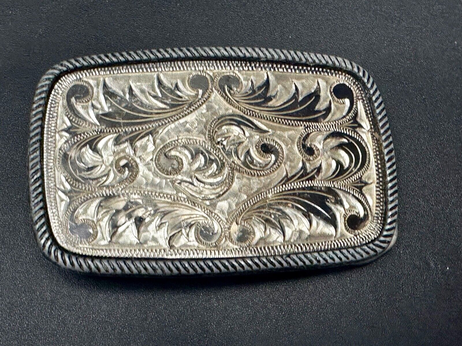 Vintage flower theme etched oval western belt buckle W/ rope border