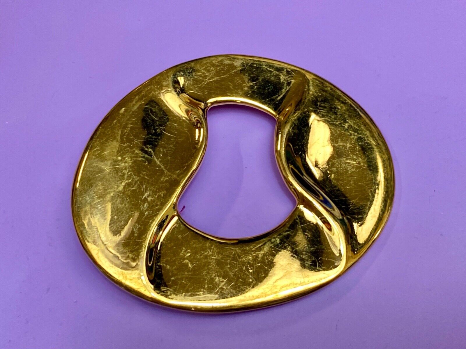 Artist Ginnie Johansen signed gold color abstract oval belt scarf slide