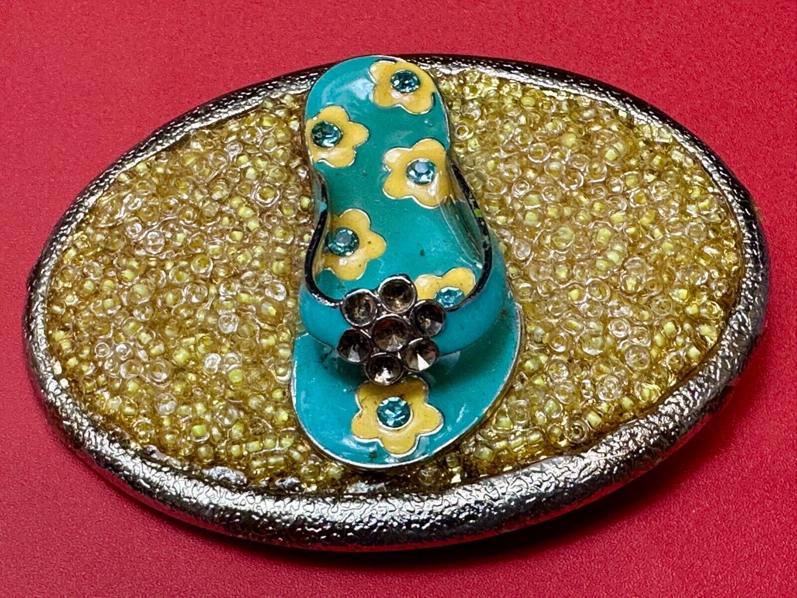 unique flip flop on sand - beach girls artisan belt buckle - missing stones?