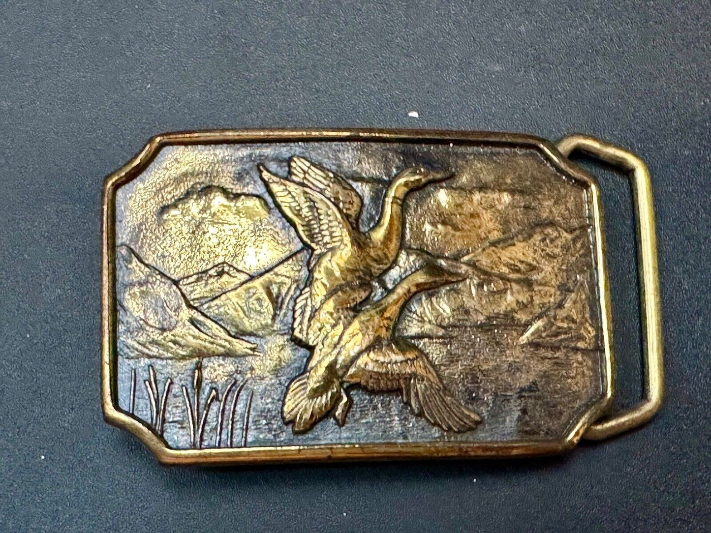 Two ducks flying from pond cat tails Nature Solid Brass belt buckle by BTS
