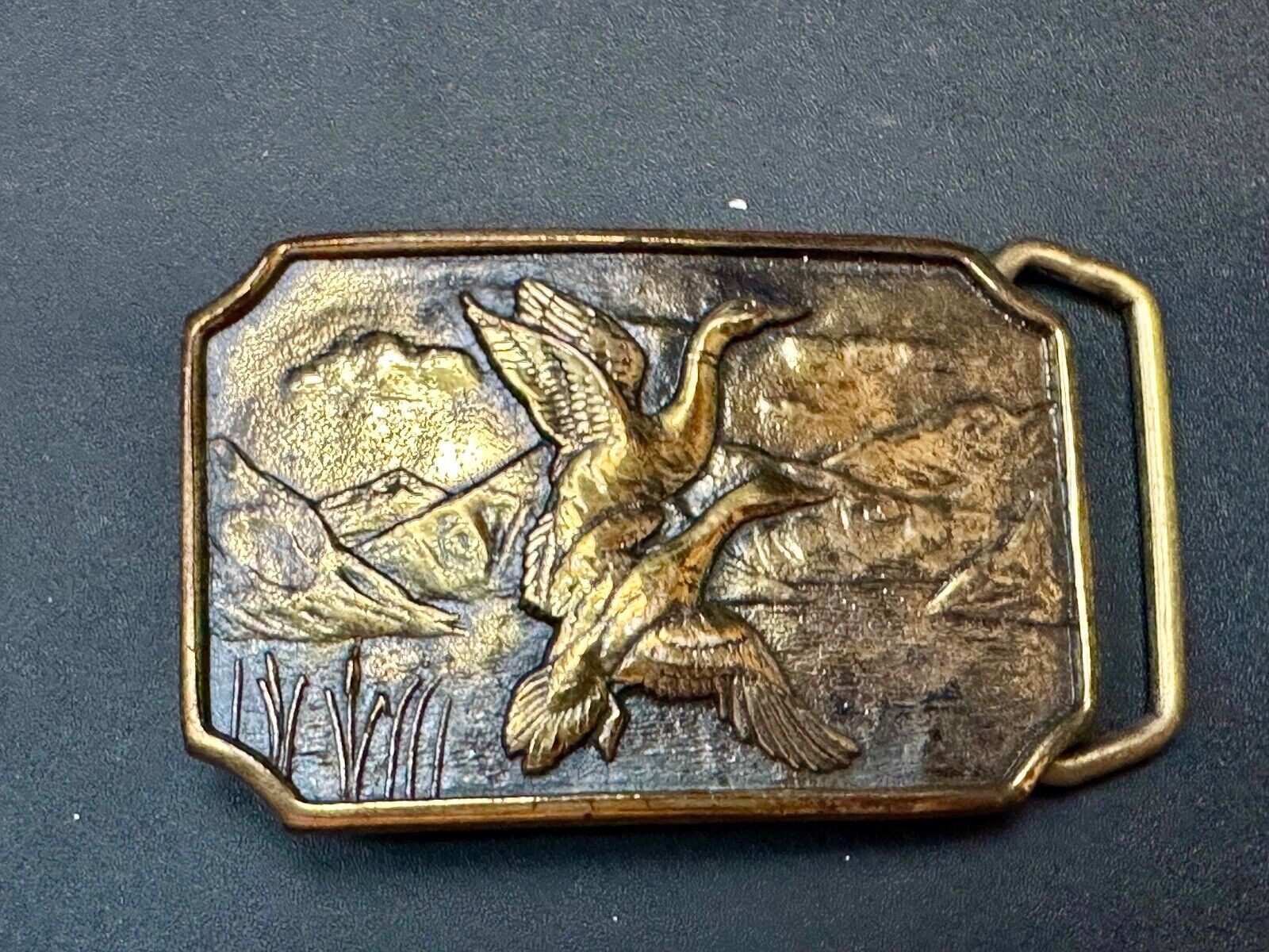 Two ducks flying from pond cat tails Nature Solid Brass belt buckle by BTS