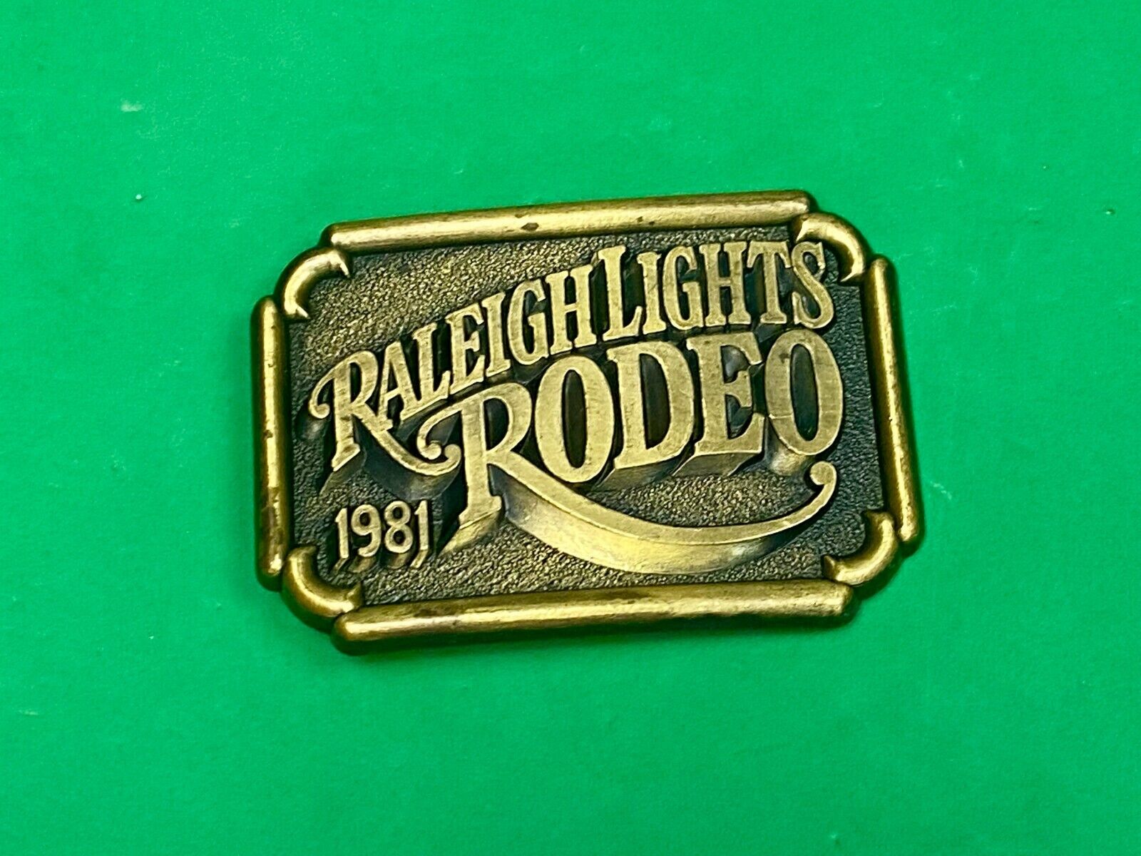Vintage 1981 Raleigh Lights Rodeo Tobacco Company Advertising Belt Buckle