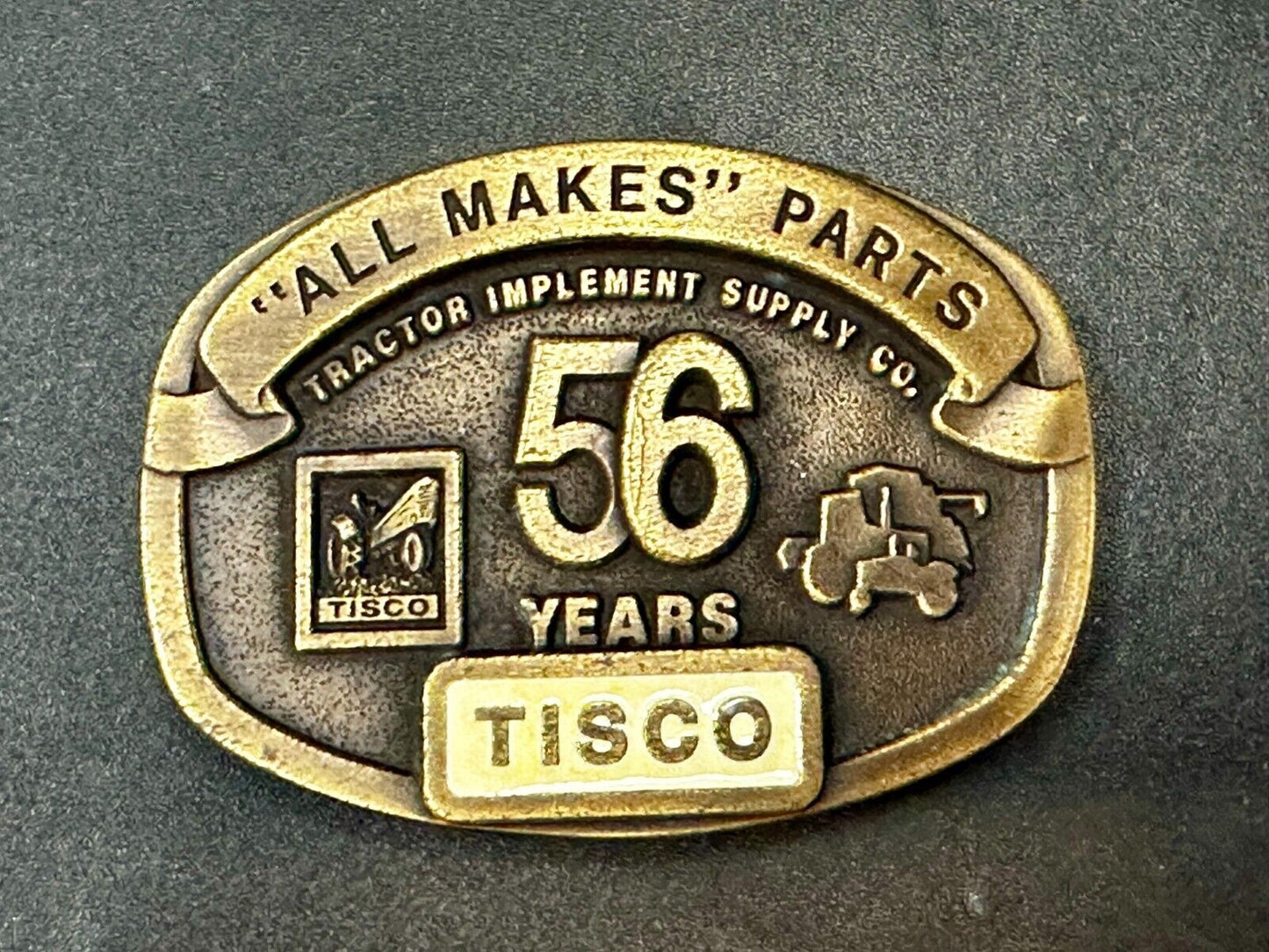 56 Years TISCO Tractor Implement Supply company NOS Belt Buckle by Speccast