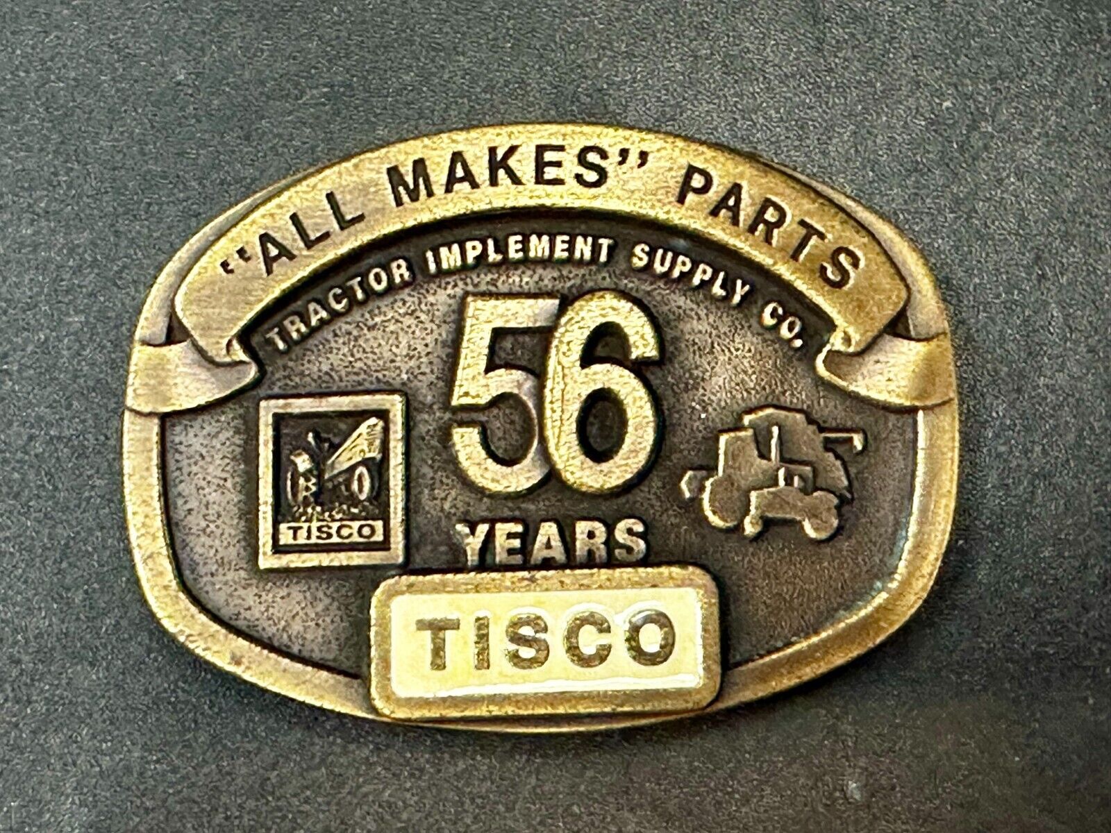 56 Years TISCO Tractor Implement Supply company NOS Belt Buckle by Speccast