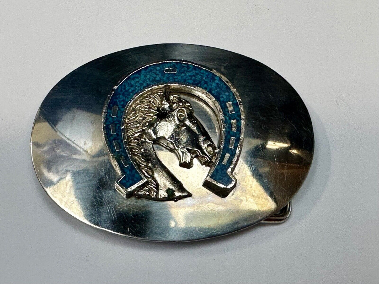 Vintage horse head bust in turquoise chip horseshoe on western belt buckle