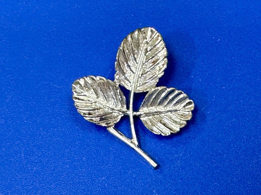 Three Leaf cutout Sarah Coventry signed silver tone brooch pin