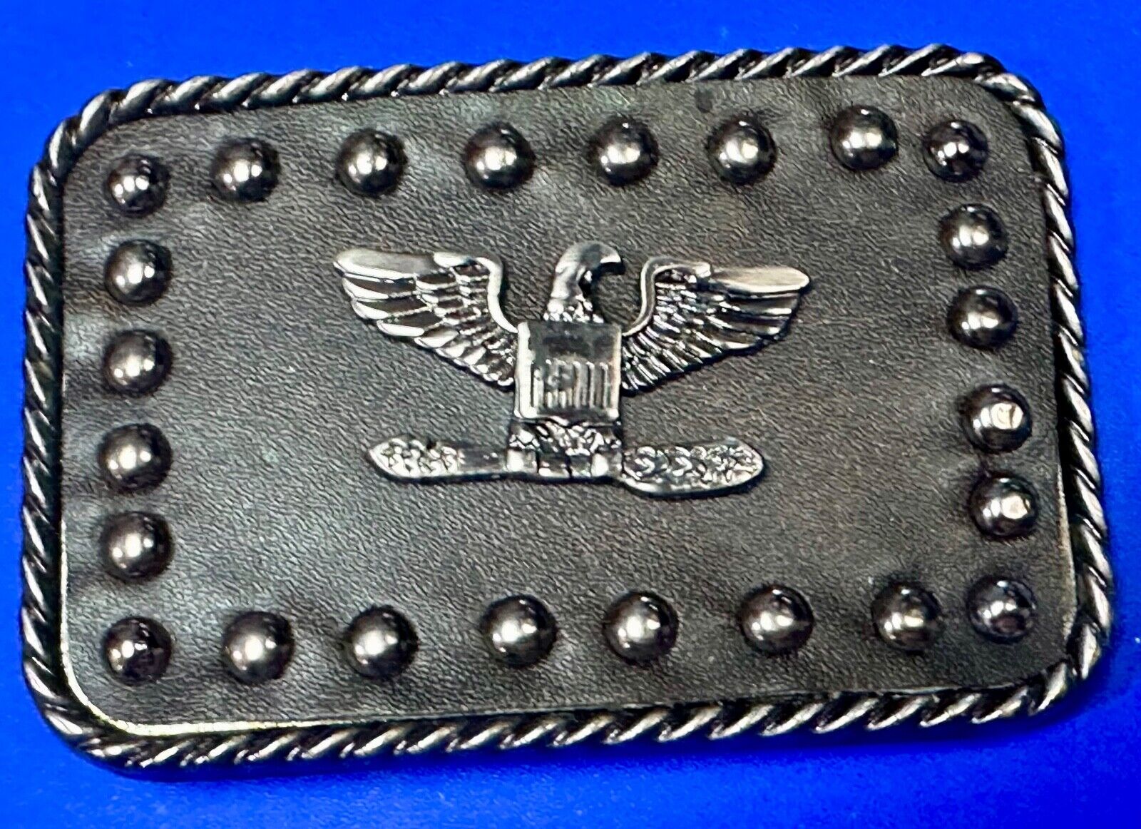 American Eagle - biker style studded black leather background belt buckle