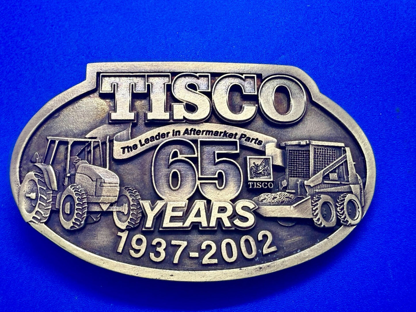 TISCO The Leader in Aftermarket Parts 65 Years 1937-2002 SPEC-CAST Belt Buckle