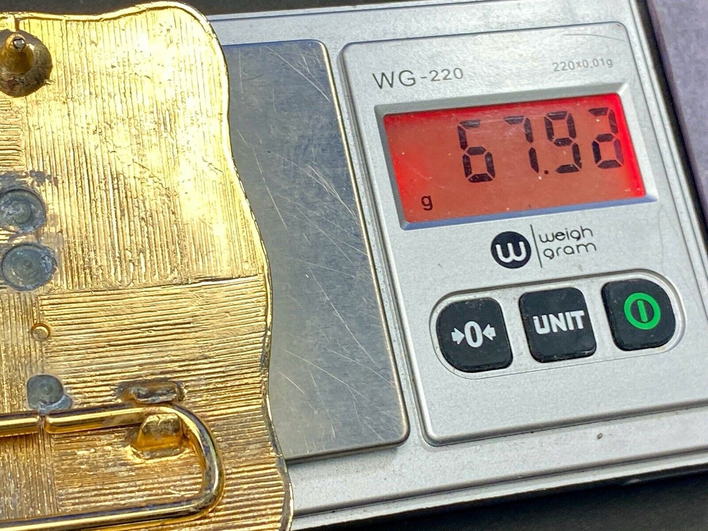 bull riding rodeo cowboy on beautiful gold color flower swirl belt buckle 