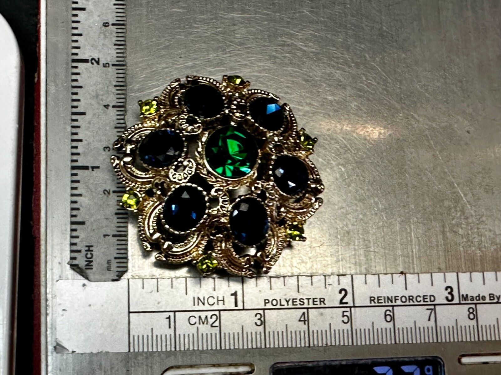 Beautiful Round Flower Shaped Blue Green Rhinestone Brooch Pin Signed by SQUIRE