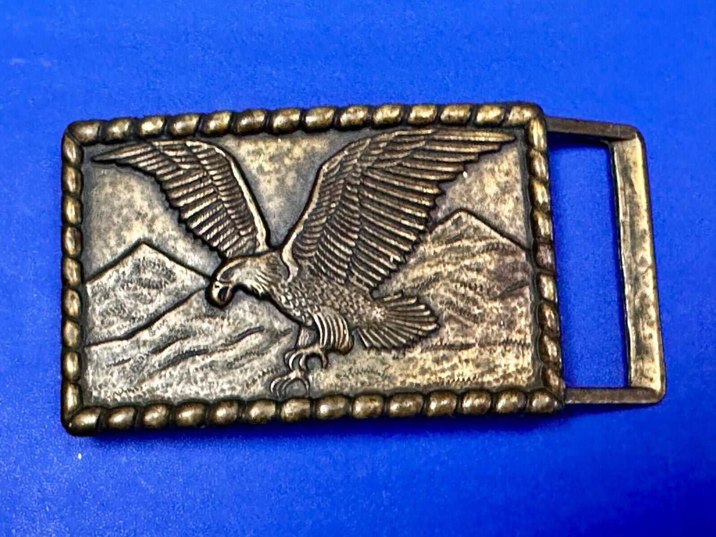 American Bald Eagle flying over majestic USA mountains Vintage Belt Buckle