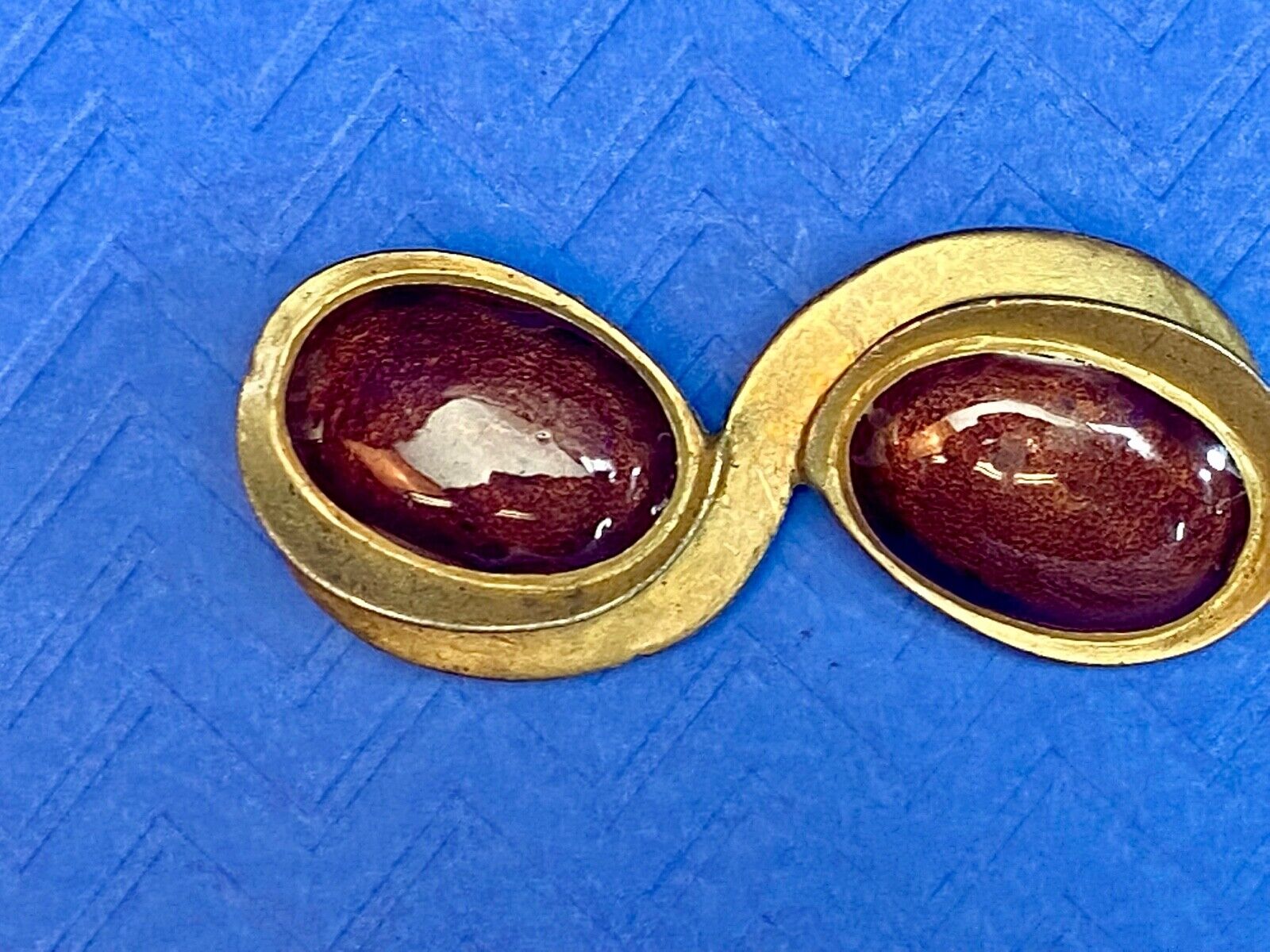 Vintage ELLE Brooch Pin Gold Tone Double Swirl w/ Two Deep Red Cabuchon Stones
