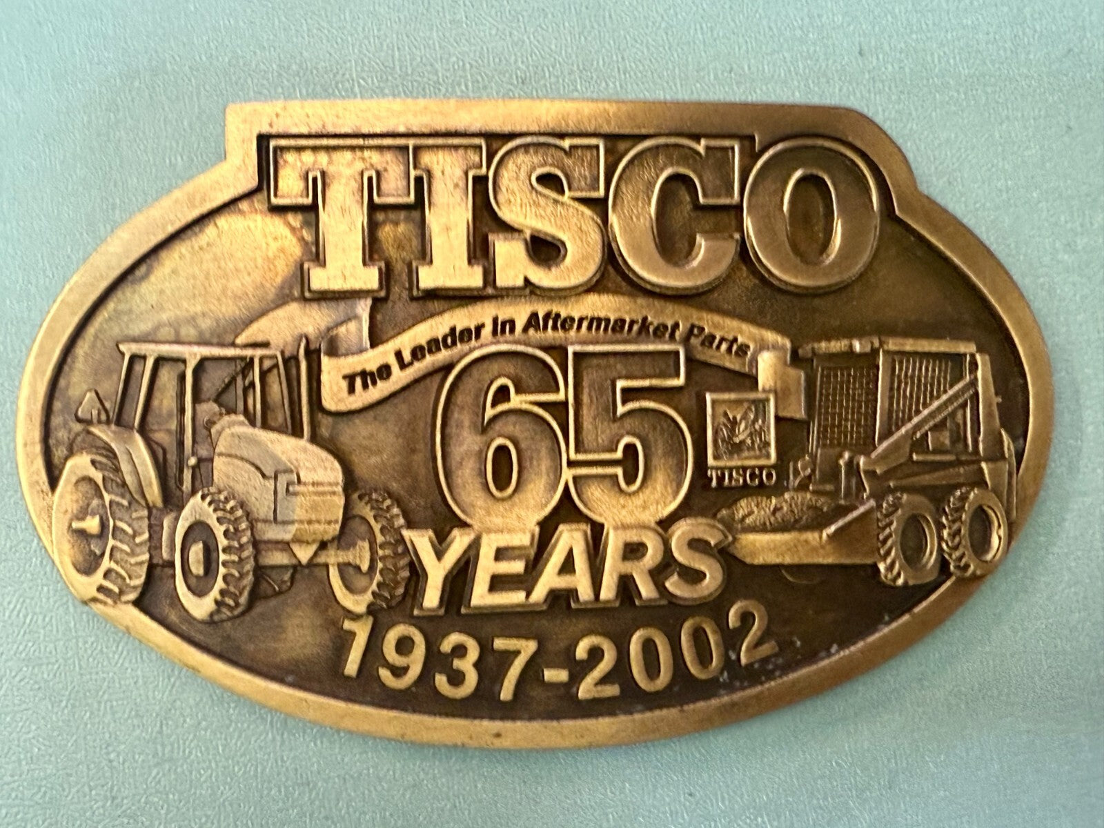 TISCO The Leader in Aftermarket Parts 65 Years 1937-2002 SPEC-CAST Belt Buckle