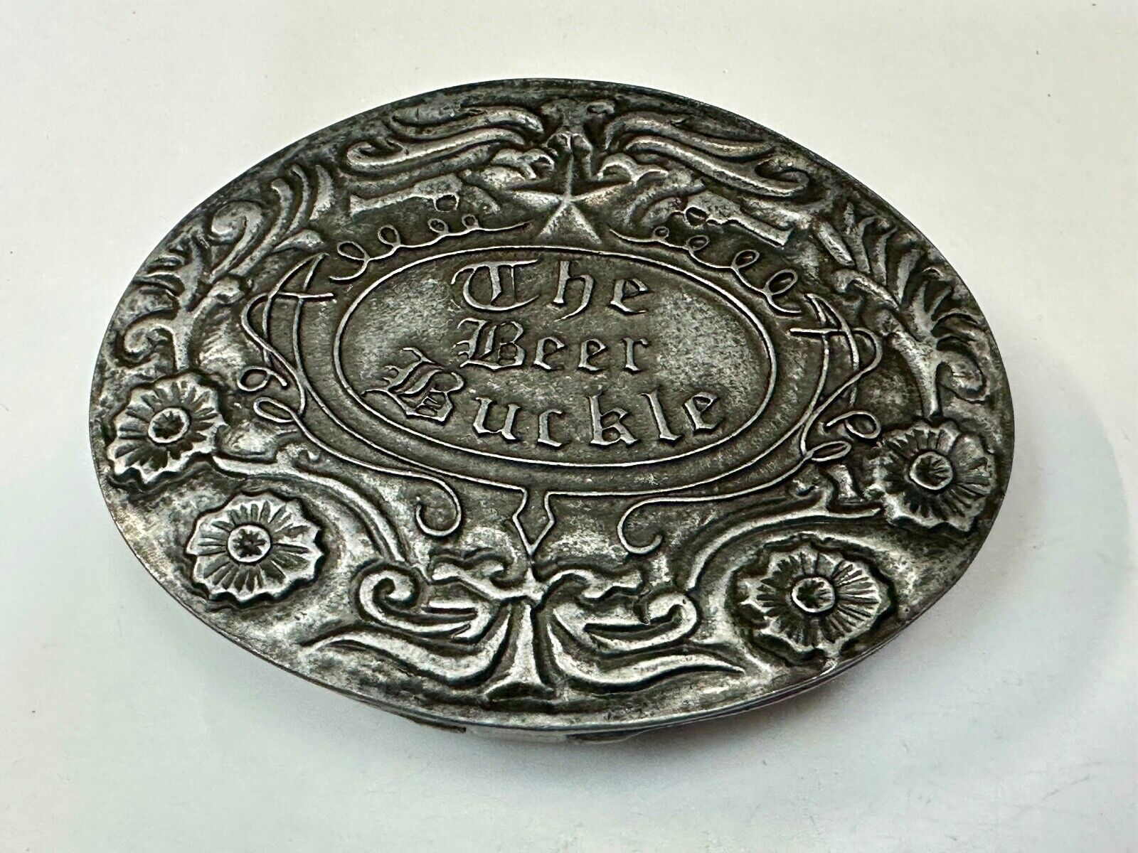 Bev Buckle The Beer Buckle Beverage Can Holder USA made Belt Buckle