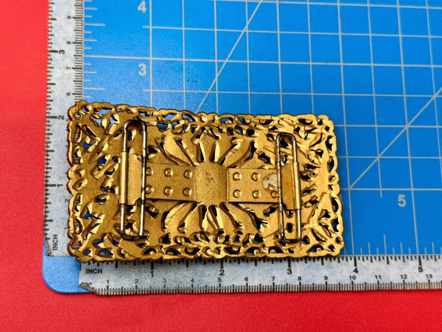 Antique gold tone? Flower theme Rhinestone covered scarf slide belt loupe buckle