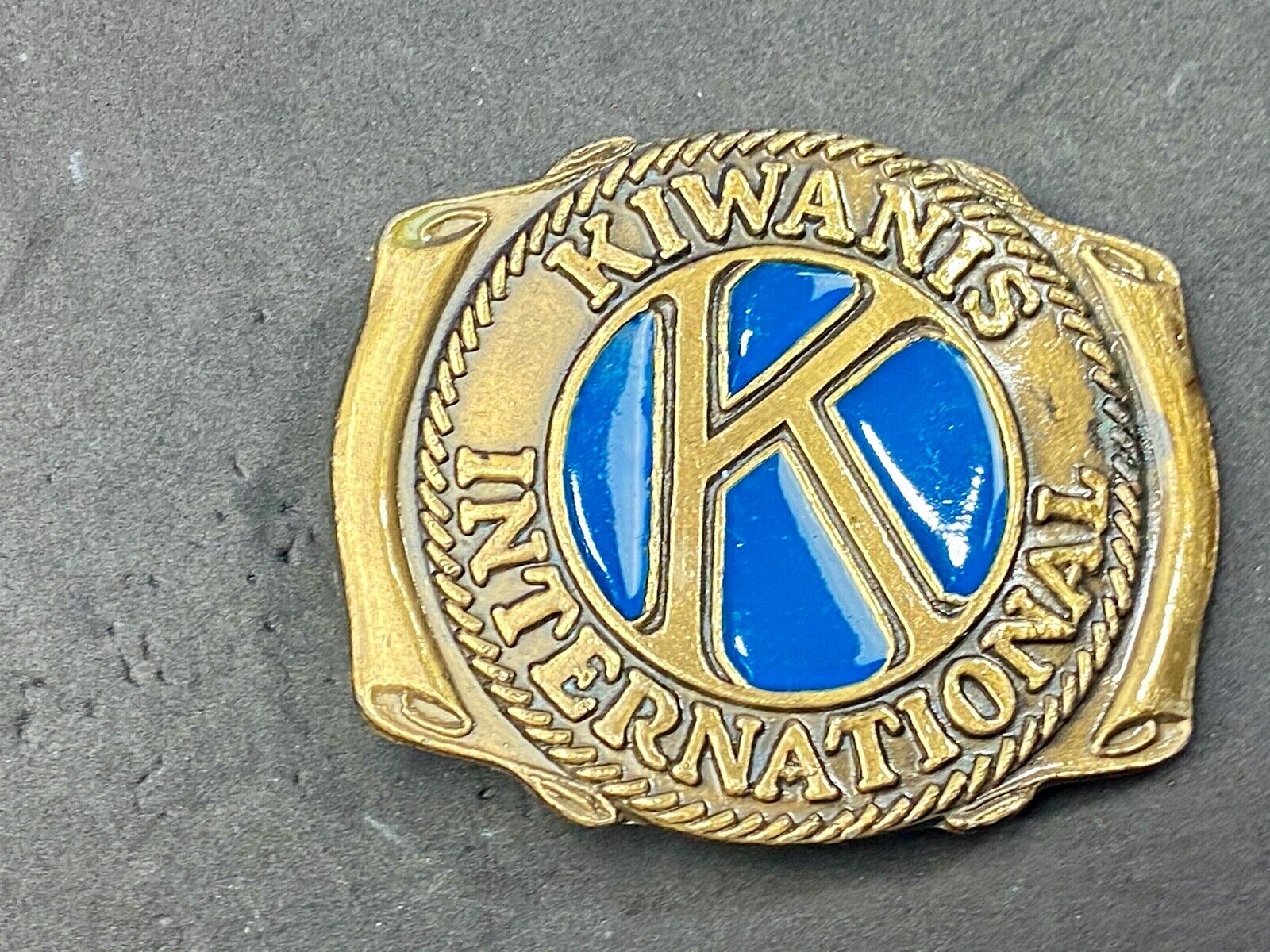 Vintage Kiwanis Club international blue enamel cut out belt buckle 