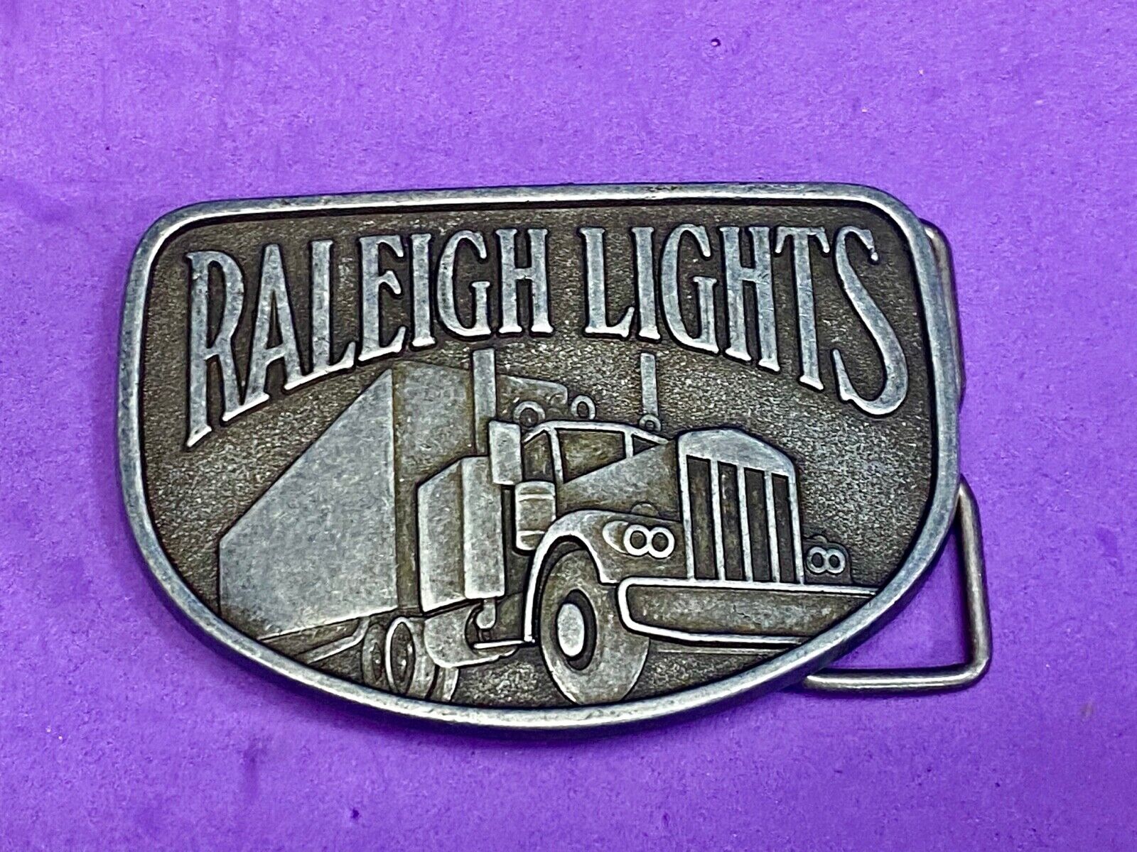 Vintage Belt Buckle Raleigh Lights Cigarette Trucker Trucking Cigarettes