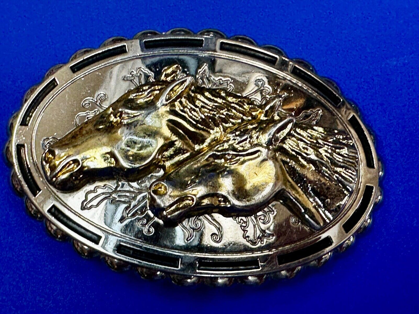 Two horse heads - Vintage two tone oval Belt Buckle with reflective backing