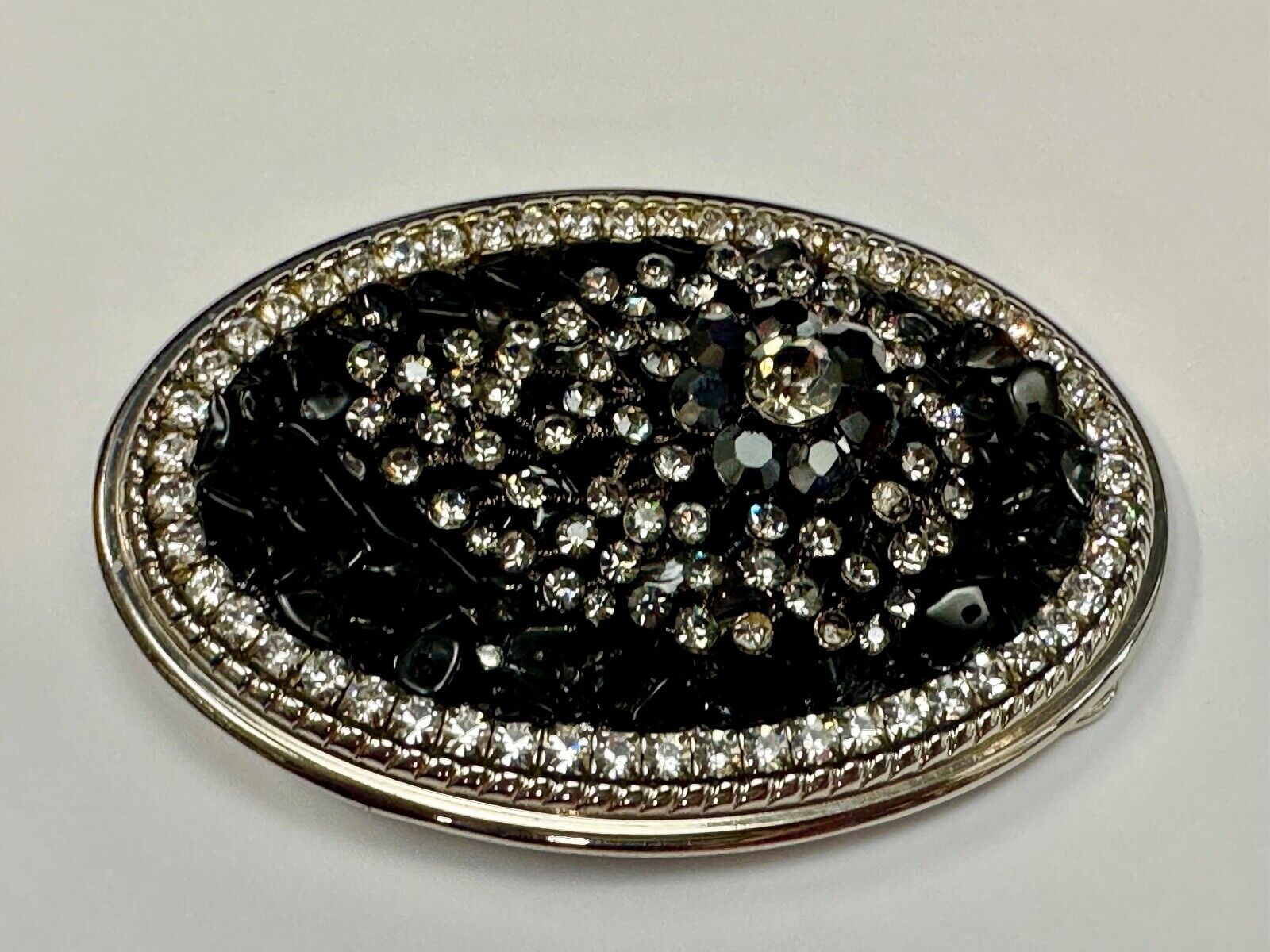 Artisan GHOST? Abstract animal head belt buckle covered in black rhinestone's