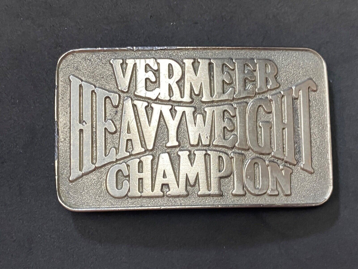Vermeer Heavyweight Champion Belt Buckle by Spec Cast
