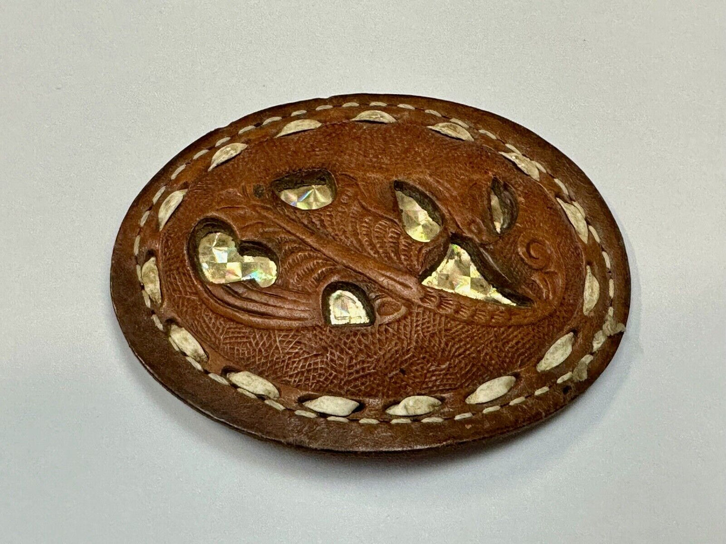 Unique leaf pattern in leather belt buckle made of Abalone shell