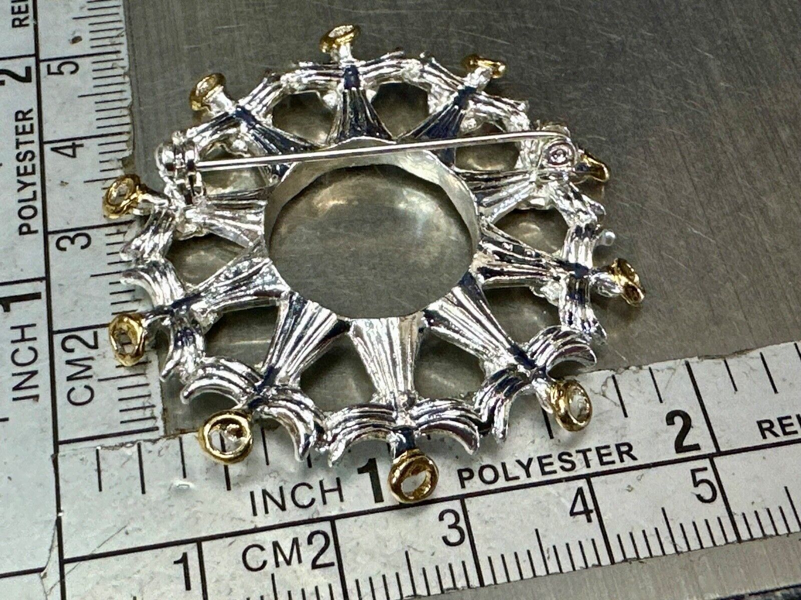 Angles in Circular pattern holiday wreath Avon signed vintage brooch pin