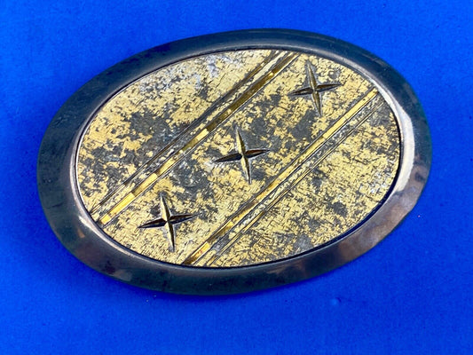 Unique XXX gold tone belt buckle tic tac toe pattern