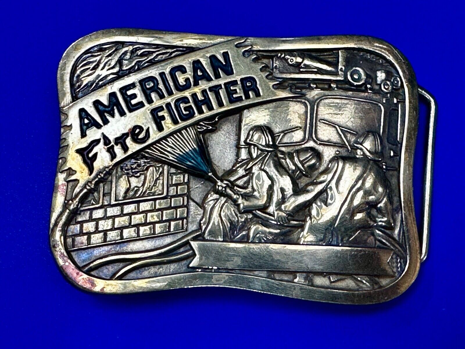 American Firefighters at work putting out fire Vintage 1981 Baron Belt Buckle