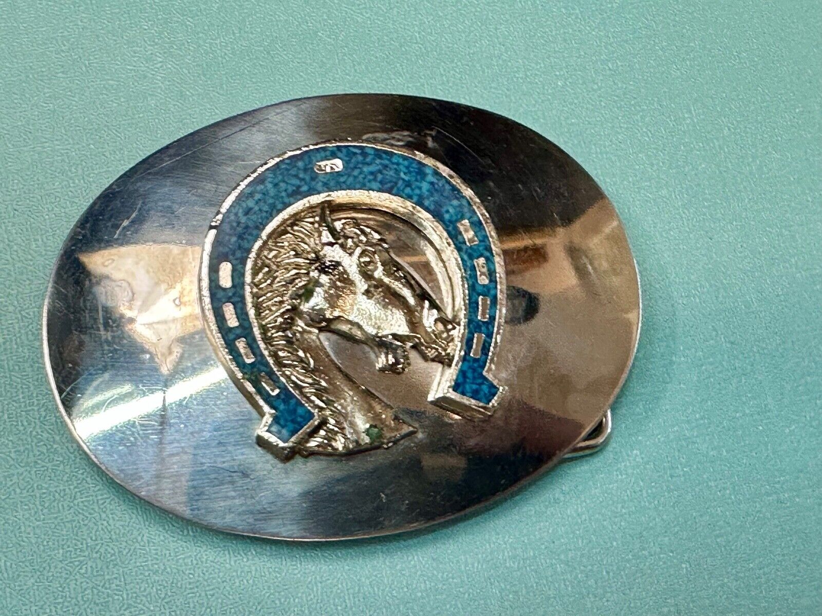 Vintage horse head bust in turquoise chip horseshoe on western belt buckle