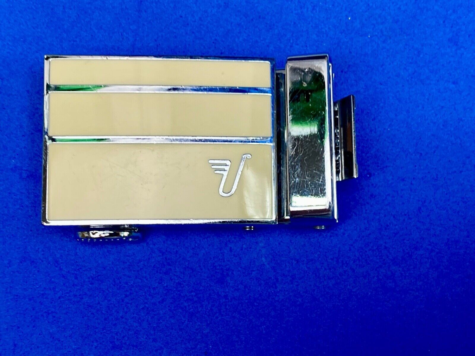 Unknown to me, Cream & silver color lines automatic slide belt buckle   U?  V?  