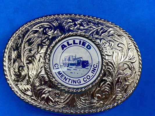 Beautiful belt buckle with centerpiece picture of Allied Cementing Company 