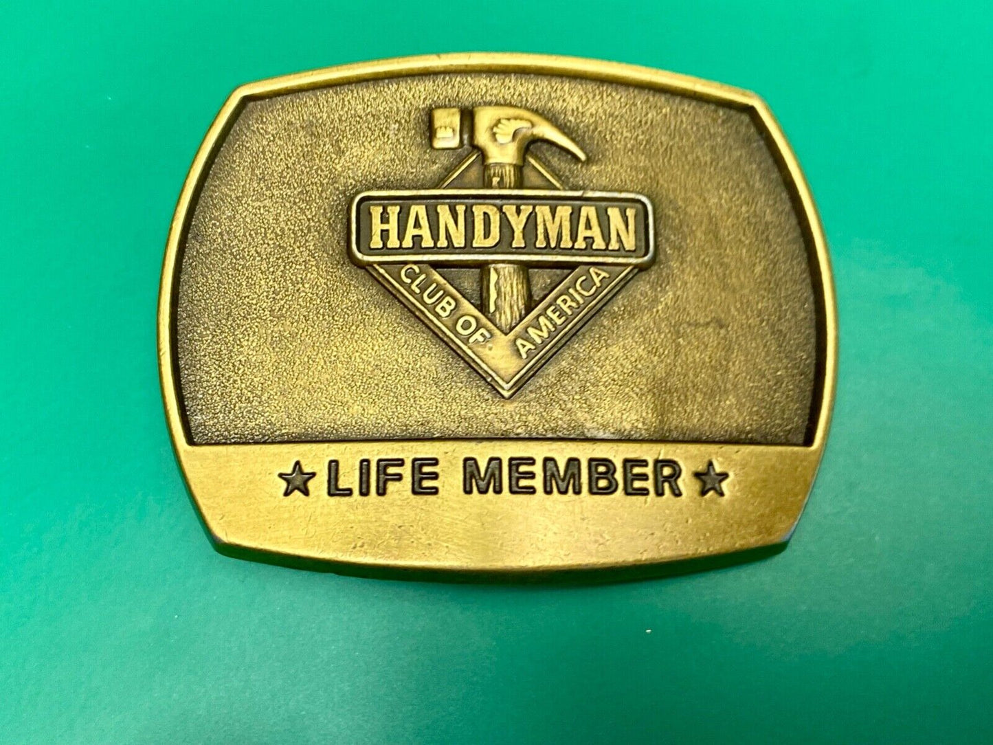 vintage handyman club of America Hammer Ruler- life member belt buckle