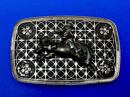 Vintage Cowboy on Saddle Bronc Western belt buckle with mesh pattern background
