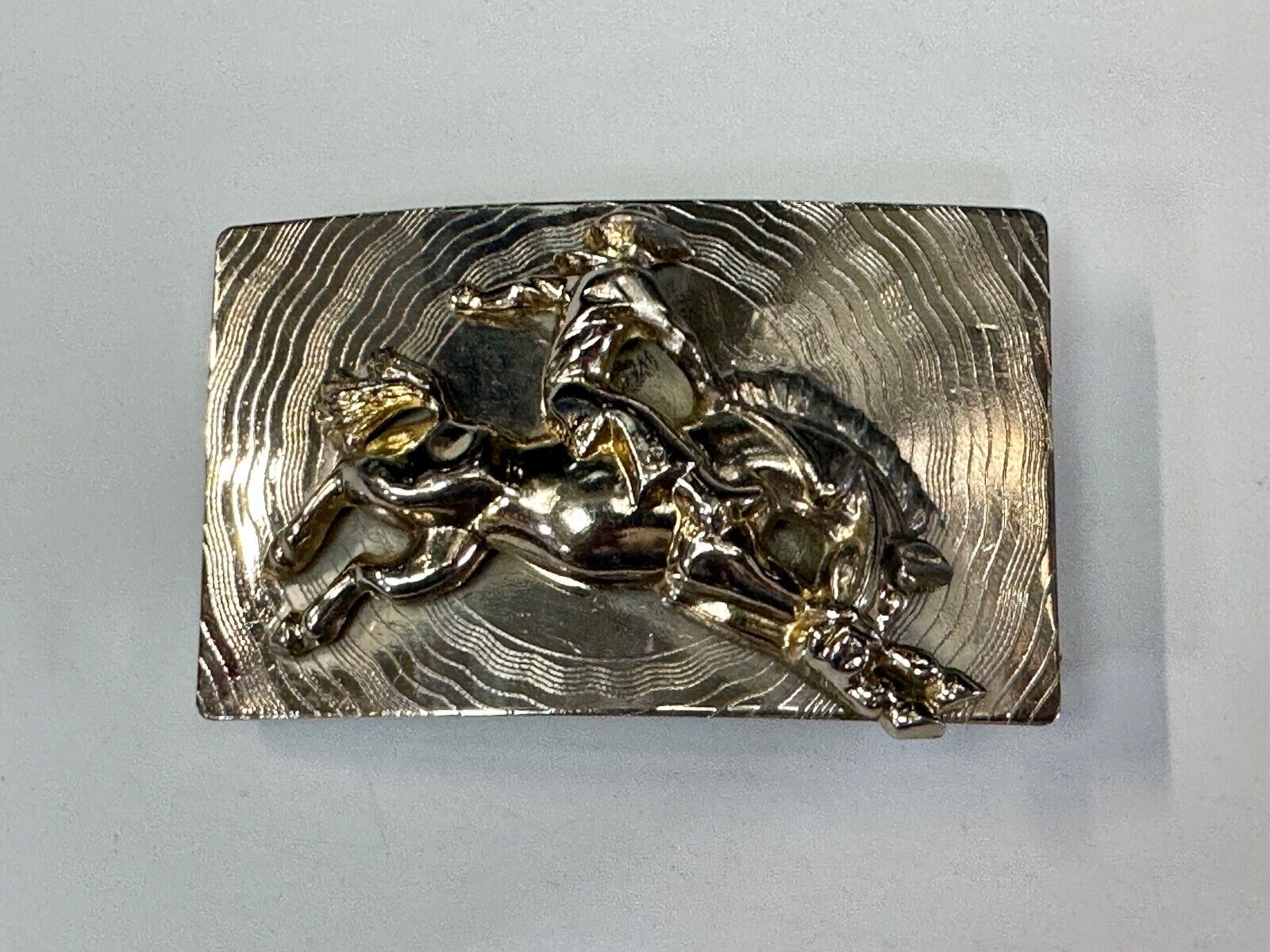 Trippy! Cowboy Saddle Bronc Horse Rider western Impact style belt buckle. - RARE