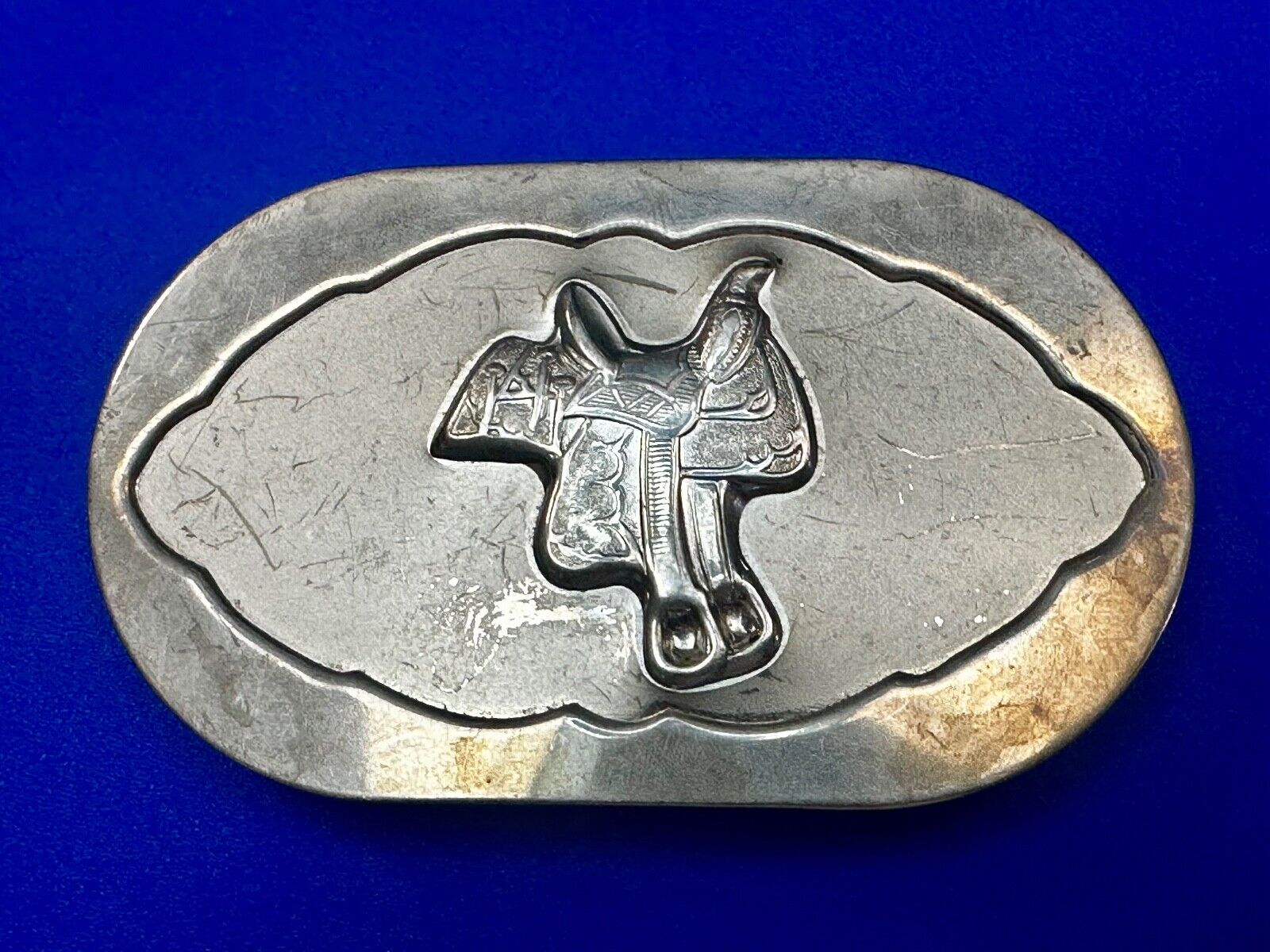 Vintage horse saddle used Belt Buckle to restore