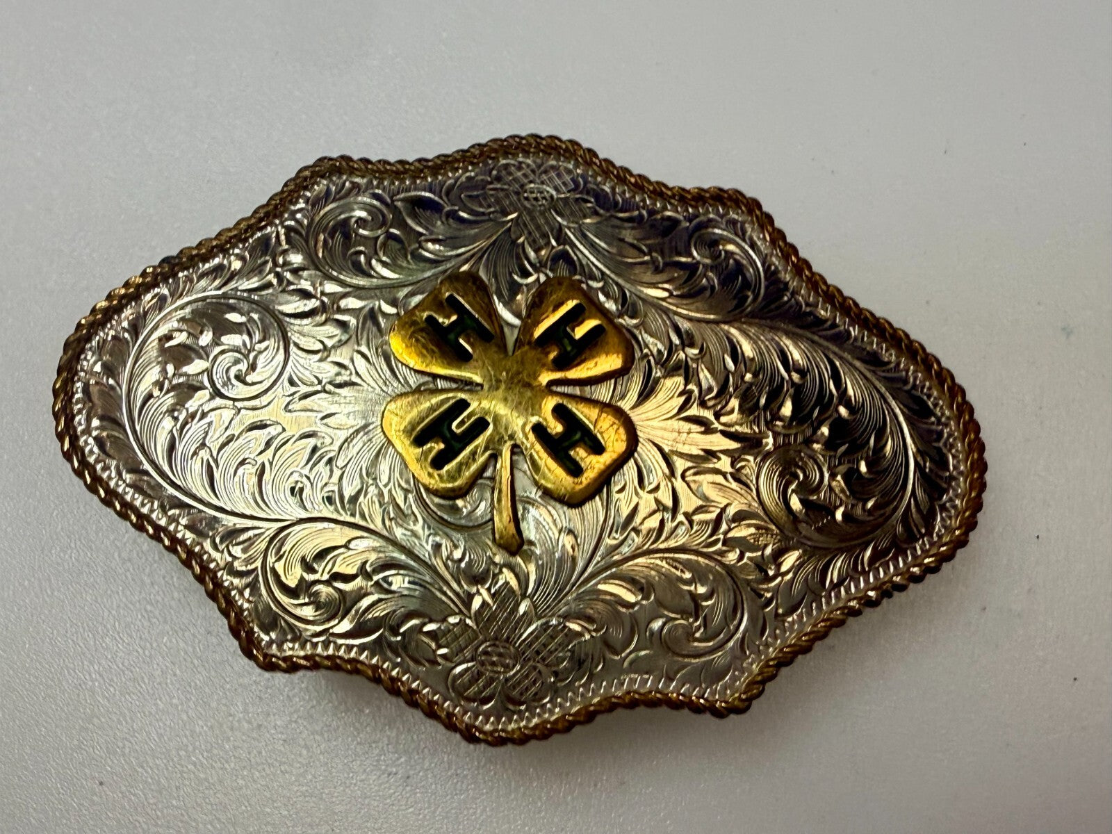 4H Leaf Swirl Ornate German Silver Montana Silversmiths Belt Buckle
